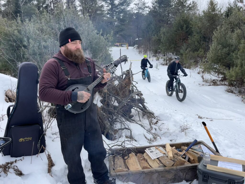 frank with a klos mandolin at the fatbike race